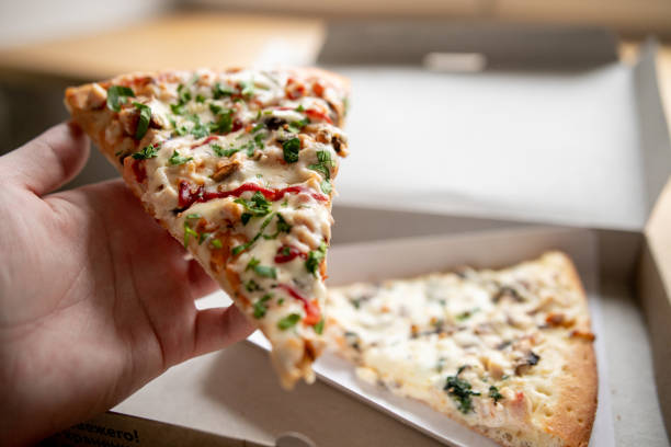 istock slice of delicious pizza delivered home 1221422868