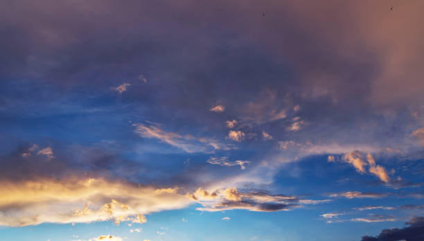 istock Beautiful sunset sky. Dramatic colorful clouds after sunset. Nature backgrounds 1221424076