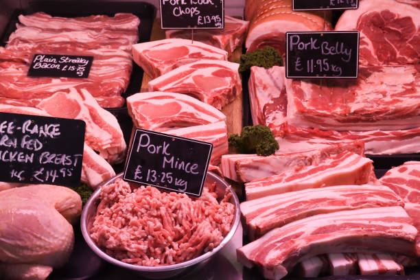 istock Various Meat cuts exposed in the butchery fridge counter. 1221424661