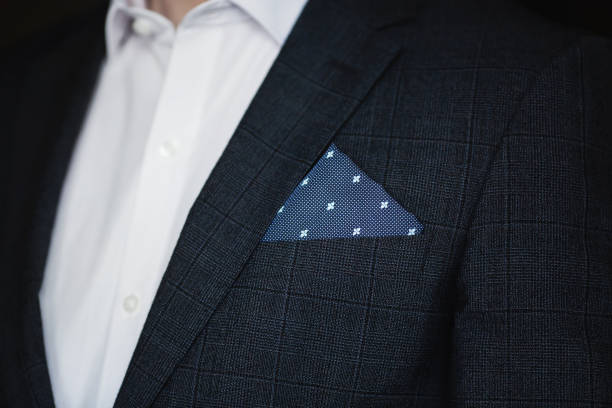 Close up of men's suit with pocket square. stock photo