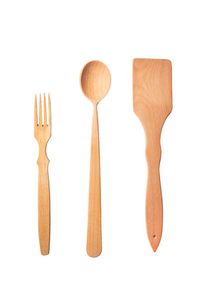 istock Set of wooden items for cooking: spoon, fork, spatula 1221426140
