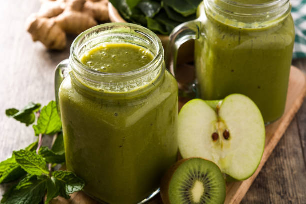 istock Healthy green smoothie in jar 1221426433