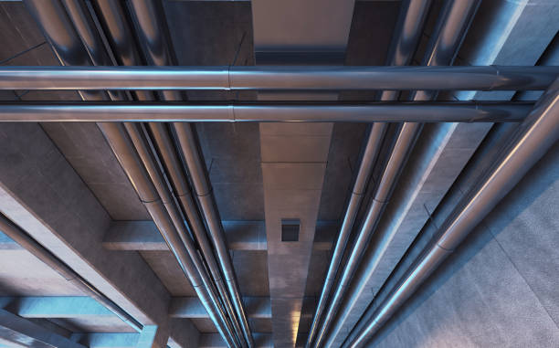 istock Underground space with metal pipes, tubes and air ducts 1221427687