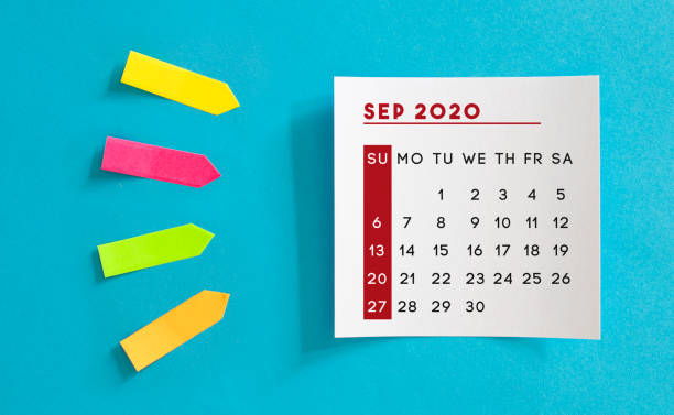 istock Calendar concept. September 2020 Calendar On The White note paper. Colored arrow-shaped sticky notes point to it. 1221428465