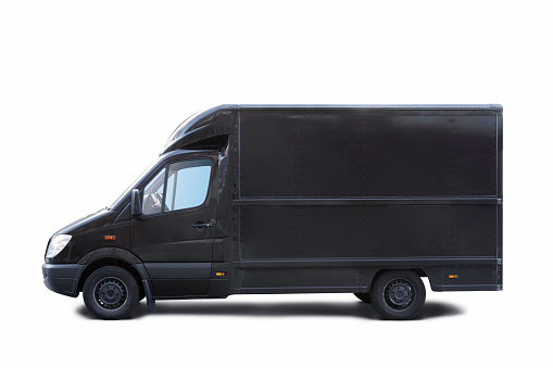 Side view of a black van isolated on white.