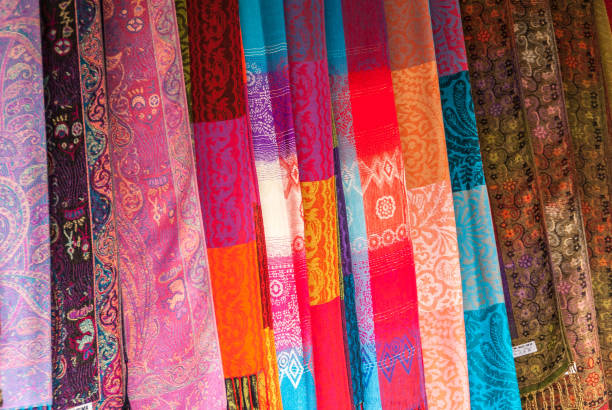 istock Wall of hanging silk shawls in Fengdu, China. 1221431073