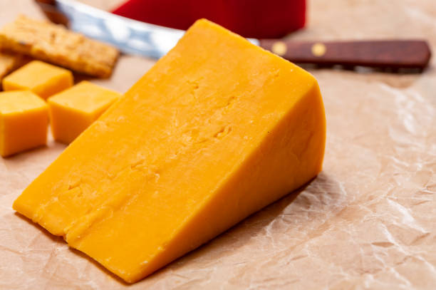 istock Matured yellow cheddar cheese close up 1221435590