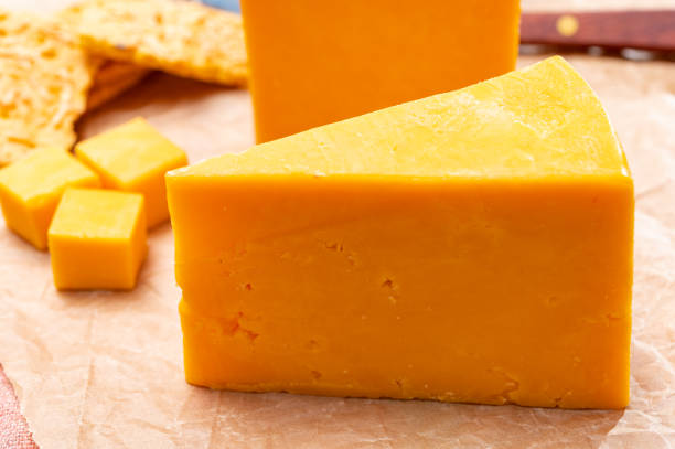 istock Matured yellow cheddar cheese close up 1221435604