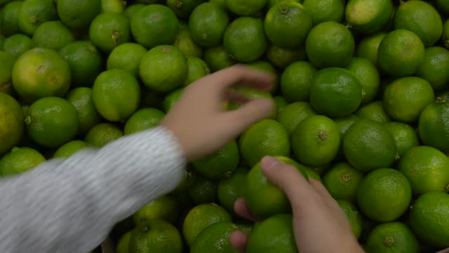 POV of a man choosing some lime