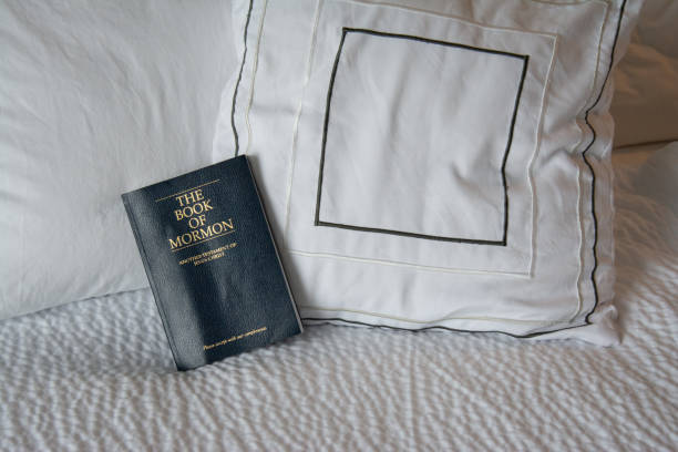 istock Book of Mormon on bed 1221437157