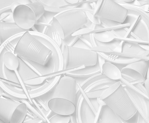 istock plastic cutlery spoon fork knife utensil recycling disposable plate cup 1221437247