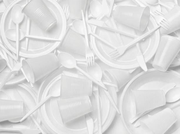 istock plastic cutlery spoon fork knife utensil recycling disposable plate cup 1221439707