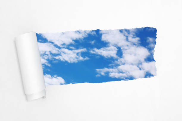 istock Blue Sky in the Hole of Torn White Paper. 3d Rendering 1221440222