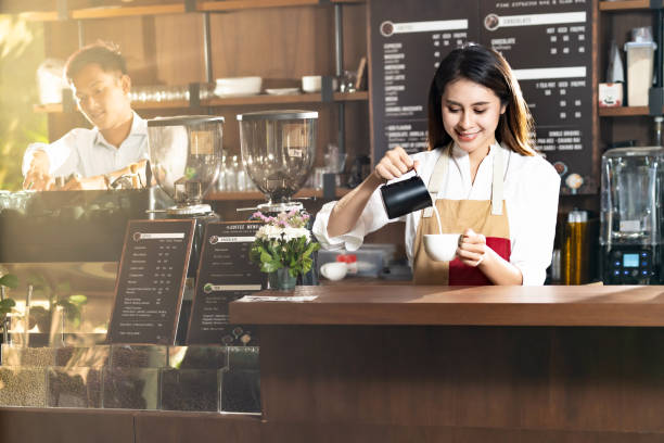 istock Woman barista working 1221440263