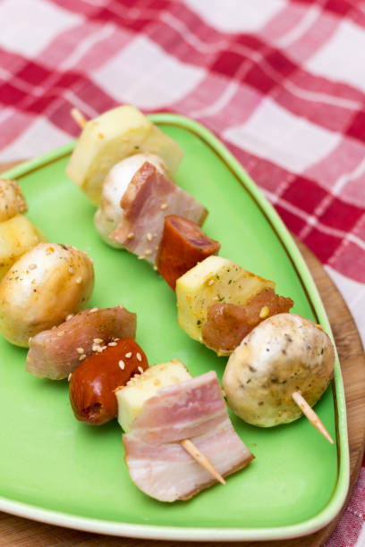 istock Meat and vegetables on wooden sticks 1221440284