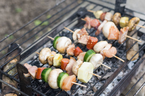 istock Selective focus on the meat and vegetables on the grill 1221441477