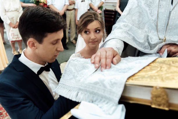 istock stylish luxury bride and elegant groom, making oaths, emotional wedding ceremony 1221443114