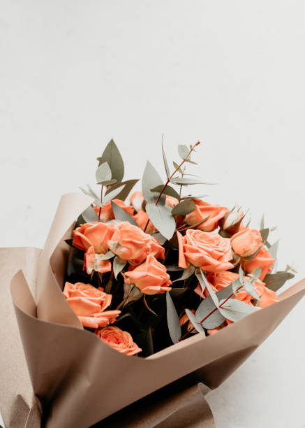 istock Bouquet is made from coral spray roses and eucalyptus branches. 1221444439