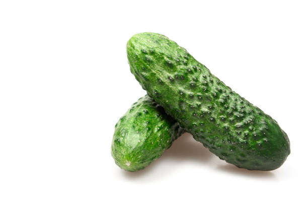 istock Green fresh cucumber isolated on white backround . 1221444741