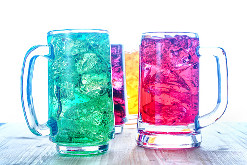 Colorful soft drink on wood table