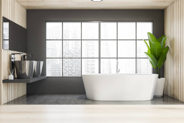 istock Panoramic gray and wooden master bathroom 1221446532
