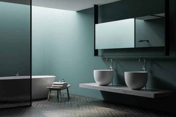 istock Green bathroom corner with tub, shower and sinks 1221449606