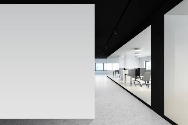 istock White and black office with mock up wall 1221450286