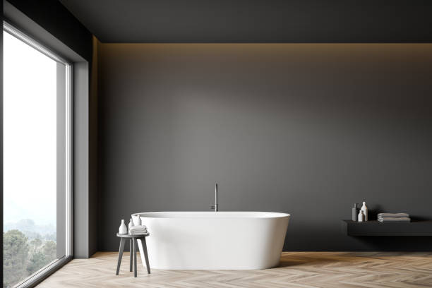 istock Minimalistic gray bathroom interior with tub 1221451305