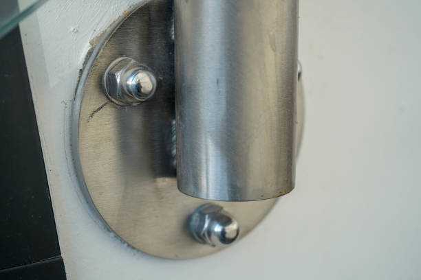 istock Industrial metal connection plate on a wall 1221451583