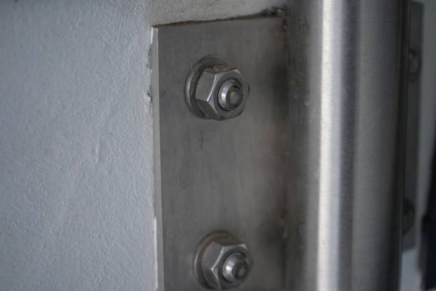 istock Industrial metal connection plate on a wall 1221451680