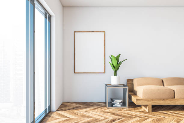istock Loft white living room with sofa and poster 1221452186