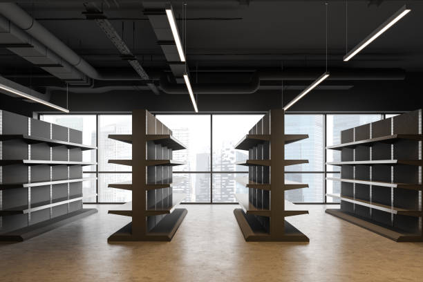 istock Empty shelves in gray supermarket, side view 1221453353