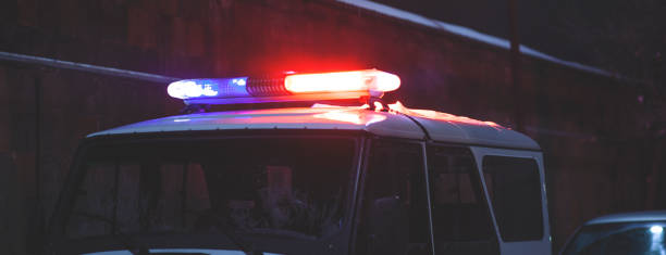 istock police car light at night street 1221453580