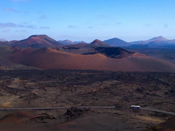 istock Auto us driving in front of inactive volcano crater 1221455138