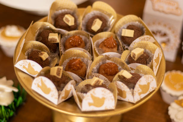 istock Baby baptism. Sweets and decoration 1221456333