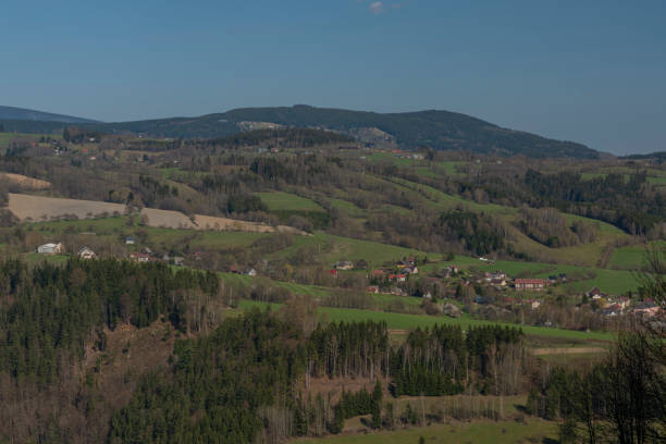 istock Meadows and forests near Krkonose mountains in spring nice day 1221456644