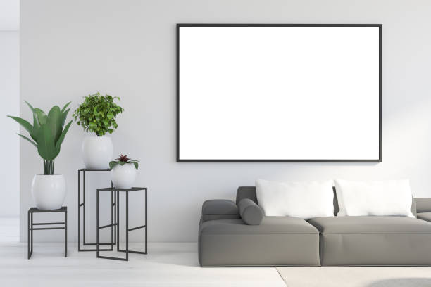 istock Mock up frame in white living room with sofa 1221456842