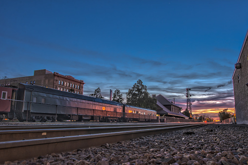 Sunset beyond the train tracks.