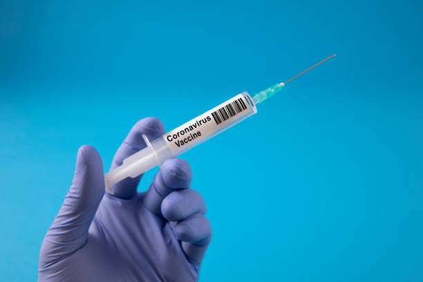 istock Coronavirus COVID-19 Vaccine in Syringe 1221460232