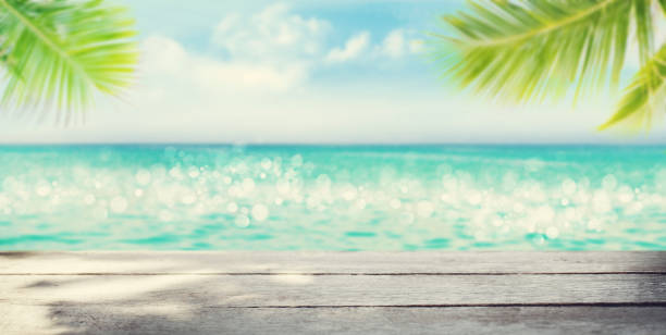 istock Summer tropical sea and empty wooden table 1221460577