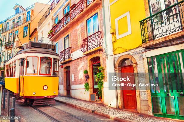 Yellow Vintage Tram On The Street In Lisbon Portugal Stock Photo - Download Image Now