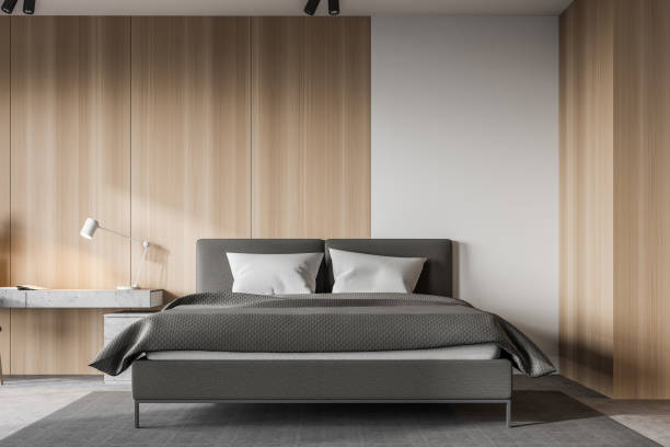 istock White and wooden master bedroom interior 1221461737