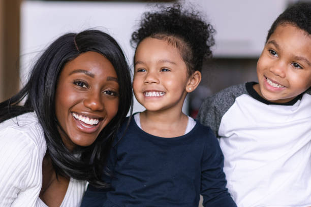 istock Adorable mother and daughter smile brightly 1221462293