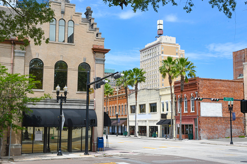 A city street with historic buildings in downtown Jacksonville.