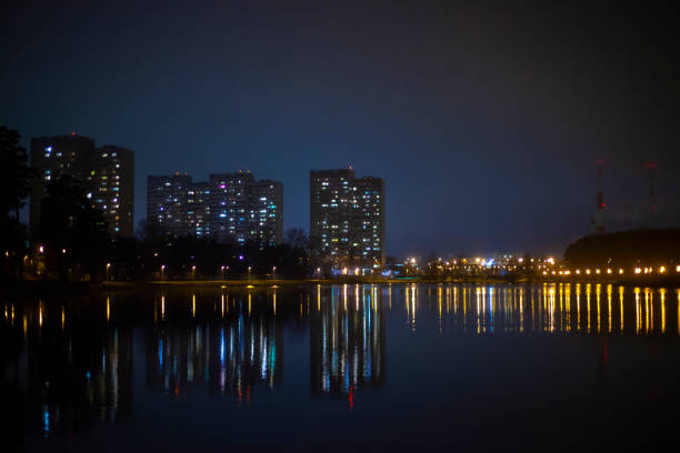 istock City lights are reflected in the water. 1221462671