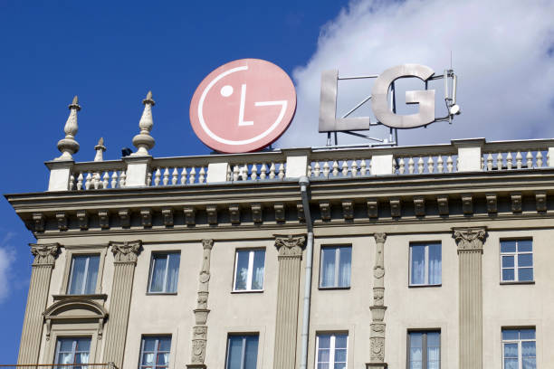 The emblem of the corporation LG on the roof of a historic building. Illustrative editorial. MINSK, BELARUS - APRIL 27, 2020: The emblem of the corporation LG on the roof of a historic building. Illustrative editorial. historic building photos stock pictures, royalty-free photos & images