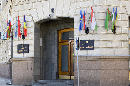 MINSK, BELARUS - APRIL 27, 2020: Flags at the entrance to the executive committee of the Commonwealth of Independent States. Illustrative editorial.