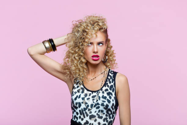 istock Young woman in 80's style look 1221465054