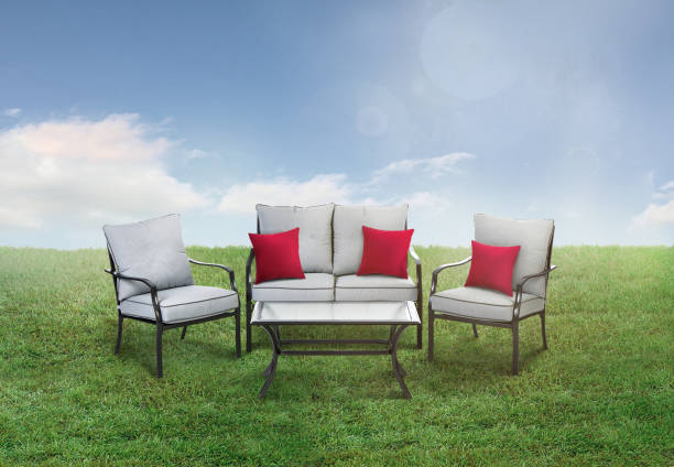 istock Patio set in a backyard with green grass and sky 1221470167