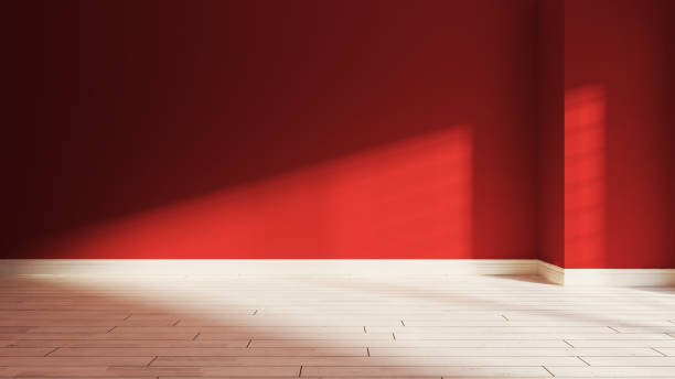istock Red wall  and sunlight from window on the wall realistic 3D rendering 1221471629